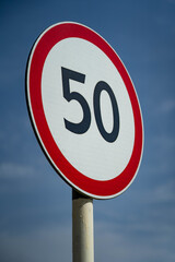 Road signs speed limit 50 km per hour. Close up shot raw footage