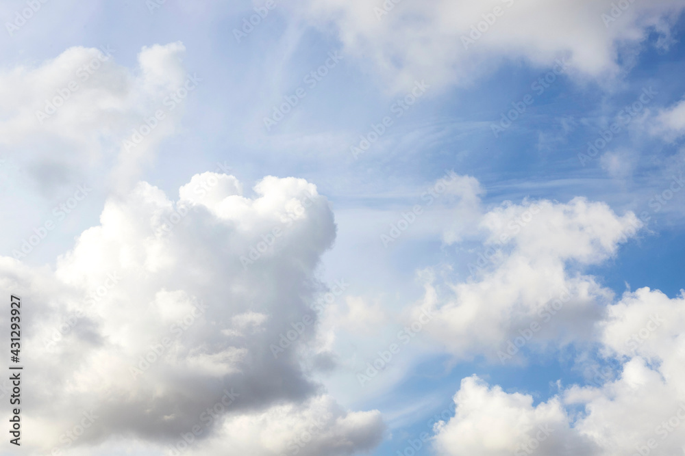 Wall mural the blue sky with fluffy clouds