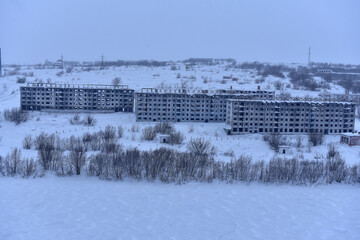 Abandoned district of Vorkuta, empty houses in winter - 431294114