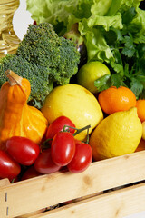 Online food delivery concept during quarantine. Fresh vegetables, fruits, food in a wooden box. Delivery from supermarket, farmers