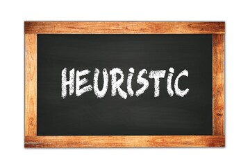 Obraz premium HEURISTIC text written on wooden frame school blackboard.