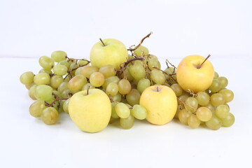 Grapes and apples. Fruit on a white background