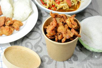 Thai style deep fried Crispy Chicken skin in a craft box