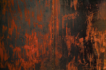 old red-brown metal sheet surface with painting brush pattern