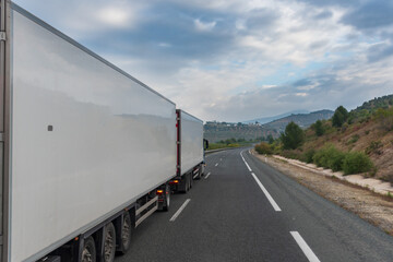 Mega truck or duo trailer, a set of a truck with two semi-trailers.