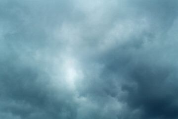 Heavy dark blue thundercloud before heavy rain. Stormy weather and dramatic sky. Natural background