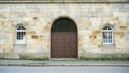 Fototapeta na wymiar Old massive door with decorative door handle and lock, all still functional