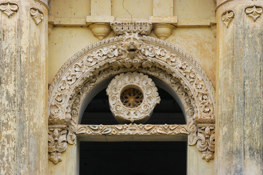 Detail view of stucco garland with lion above entrance of  famous historical rajbari or royal palace in Natore, Rajshahi, Bangladesh
