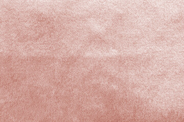 Rose gold pink velvet background or velour flannel texture made of cotton or wool with soft fluffy...