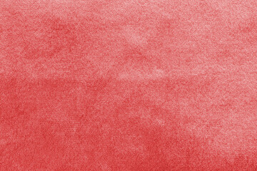 Red velvet background or velour flannel texture made of cotton or wool with soft fluffy velvety satin fabric cloth rose gold metallic color material