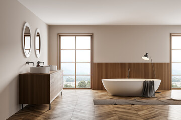 Fototapeta na wymiar Wooden bathroom interior with two sinks and bathtub with lamp