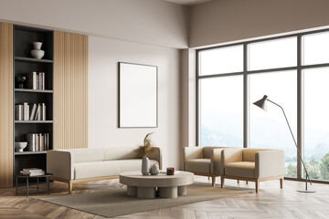 Light living room interior with sofa and armchairs, bookshelf and poster mock up