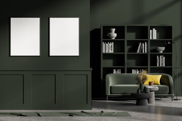 Fototapeta premium Modern living room interior with concrete floor, furniture, table and sofa. Home architecture concept. Two posters canvas on green wall. Mock up.