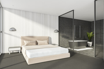 Modern Bathroom bedroom interior in new luxury home. Stylish hotel room. Open space area. Wooden walls carpet floor. Grey bathtub.