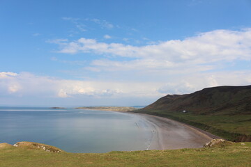 A photograph of the view at Rhossili Bay, on the Gower peninsula, Wales, UK