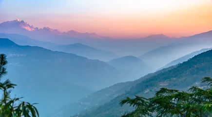 Photo sur Plexiglas Kangchenjunga Foggy Mountain Layers with Kanchenjunga , at the time of Sunset.
