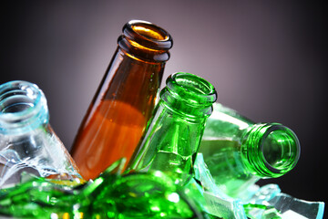 Broken glass bottles and pieces of glass. Recycling.