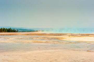 Distant side view of Grand Prismatic Spring on the Fairy Falls trail