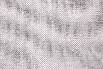 Fototapeta premium Light linen canvas background, close-up, macro view