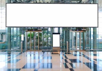 Blank advertising banner, billboard mockup in generic modern interior retail environment. Large digital display screen, an out-of-home OOH media display space
