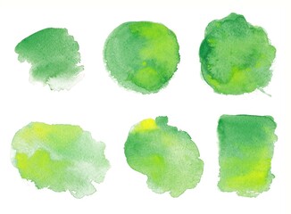 Watercolor brush strokes on a white background. Green color. Watercolor illustration. Texture stains