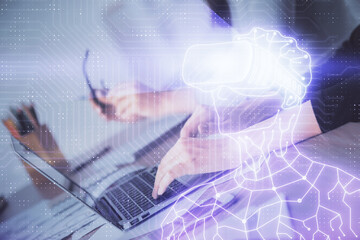 Double exposure of woman hands typing on computer and man in AR glasses drawing. Education concept.