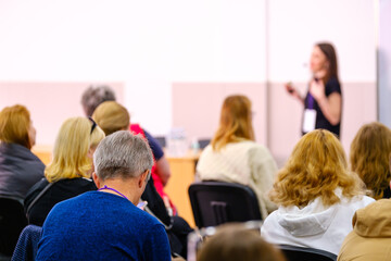 Business speaker doing presentation to audience