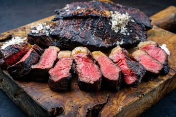 Traditional barbecue dry aged wagyu Brazilian picanha steaks from the sirloin cap of rump beef...