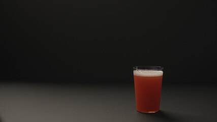 berry drink in tumbler glass on black paper background with copy space