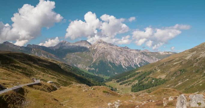 Beautiful Switzerland mountain landscape timelapse. View to the Switzerland side of Spl&uuml;gen (Spluga) pass, canton of Graubunden, Switzerland