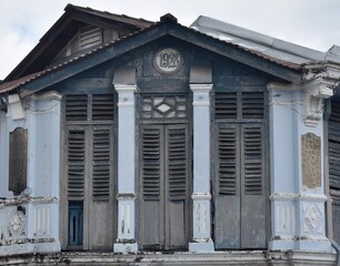 Wooden facade of a traditional building in George Town, Penang, Malaysia