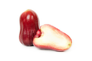 Depth of field. Group of Rose apple or Java apple or Syzygium seed with Full on wooden tray. isolated on white background. fruit flavors of sweet red gloss. Fresh fruit.