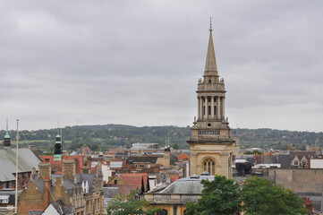 Fototapeta na wymiar Rooftop view towards All Saints Church on an overcast day, Oxford, United Kingdom.