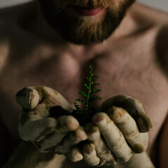  hand holding the plant © Katya