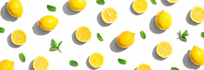 Fresh yellow lemons with mints overhead view