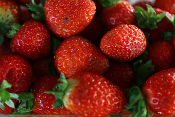 Strawberry fruits on grocery shelf.