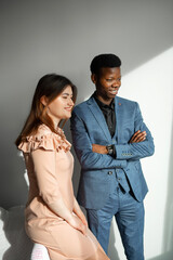 portrait of young people, african man and caucasian woman 
