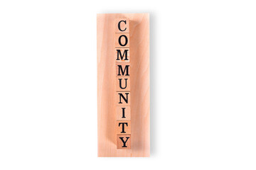 Community - word from wooden blocks with letters with Plywood surface on white background