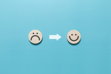Changing sad to smiley face icon on blue background. Service rating, satisfaction concept