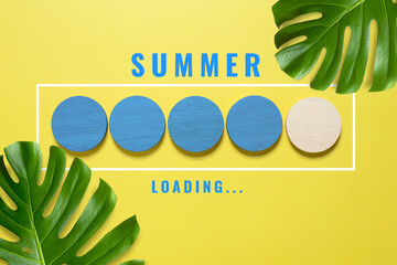 Wood sphere for countdown to summer on yellow background. Summer is coming concept