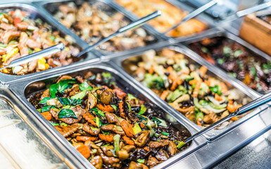 Asian food sold in a shopping mall food court