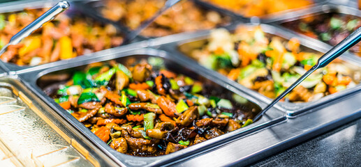 Asian food sold in a shopping mall food court