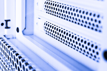 Horizontal ventilation grille. Air vents. Metal construction. Angle view. Black and white tones.