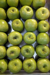 green apples are sold in the market