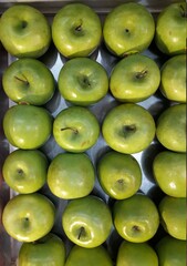 green apples are sold in the market
