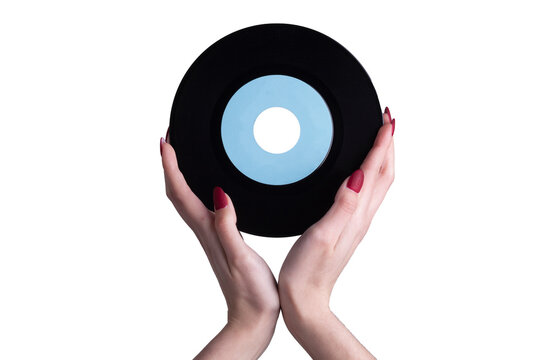 female hand holds a 45 rpm vinyl record. Isolate on a white background.