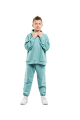 boy in turquoise blue tracksuit isolated on white background.