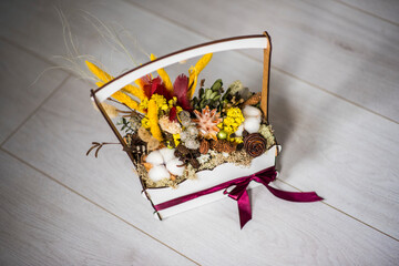 Colourful decoration  with yellow and other flowers with grey background