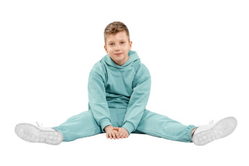 boy in turquoise blue tracksuit isolated on white background.