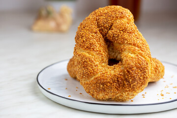 Turkish fast food bagel called Simit. Turkish bagel Simit with sesame. Bagel is traditional Turkish bakery food.